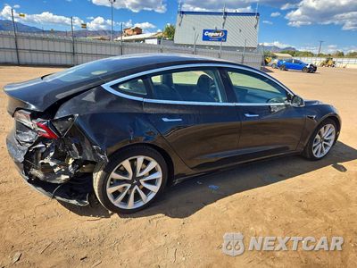 Trzecie zdjęcie samochodu z tyłu: 2018 TESLA MODEL 3 VIN:5YJ3E1EB5JF184594 - miniatura