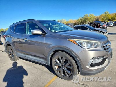 Czwarte zdjęcie samochodu z boku: 2018 HYUNDAI SANTA FE SPORT 2.0T ULTIMATE VIN:5XYZWDLA4JG536883 - miniatura