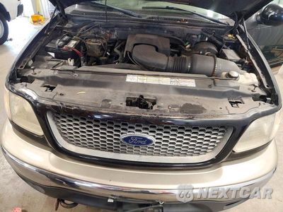 Zdjęcie 11 z 12 samochodu: 2001 FORD F150 SUPERCREW VIN:1FTRW08L31KE19552 - miniatura