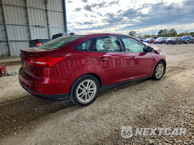 Trzecie zdjęcie samochodu z tyłu: 2016 FORD FOCUS SE VIN:1FADP3F28GL237678 - miniatura