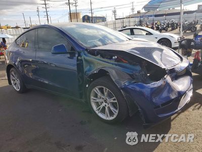 Czwarte zdjęcie samochodu z boku: 2023 TESLA MODEL Y VIN:7SAYGDEE0PA090305 - miniatura