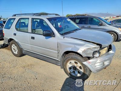 Czwarte zdjęcie samochodu z boku: 1999 ISUZU RODEO S VIN:4S2CM58W1X4302881 - miniatura