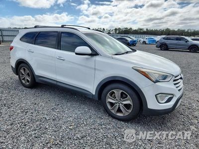 Czwarte zdjęcie samochodu z boku: 2014 HYUNDAI SANTA FE GLS VIN:KM8SM4HF4EU067404 - miniatura