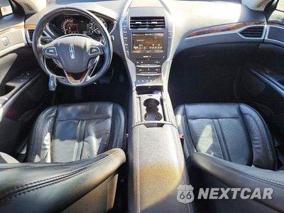 Zdjęcie 8 z 12 samochodu: 2016 LINCOLN MKZ VIN:3LN6L2G96GR606894 - miniatura