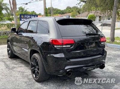 Trzecie zdjęcie samochodu z tyłu: 2014 JEEP GRAND CHEROKEE SRT-8 VIN:1C4RJFDJ9EC555495 - miniatura
