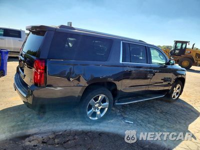 Trzecie zdjęcie samochodu z tyłu: 2017 CHEVROLET SUBURBAN C1500 PREMIER VIN:1GNSCJKC6HR177521 - miniatura