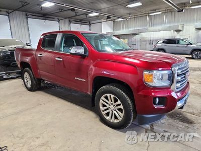 Czwarte zdjęcie samochodu z boku: 2017 GMC CANYON SLT VIN:1GTG6DEN9H1299342 - miniatura
