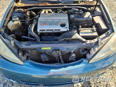Zdjęcie 11 z 12 samochodu: 2004 TOYOTA CAMRY LE V6 VIN:4T1BF32K64U576029 - miniatura