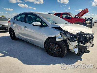 Czwarte zdjęcie samochodu z boku: 2016 KIA FORTE LX VIN:KNAFK4A68G5531438 - miniatura