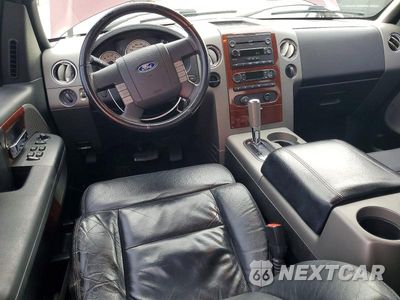 Zdjęcie 8 z 12 samochodu: 2005 FORD F150 VIN:1FTRX12525KD79905 - miniatura