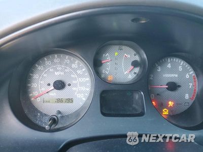 Zdjęcie 9 z 13 samochodu: 2000 TOYOTA RAV4 BASE VIN:JT3GP10V4Y7071835 - miniatura