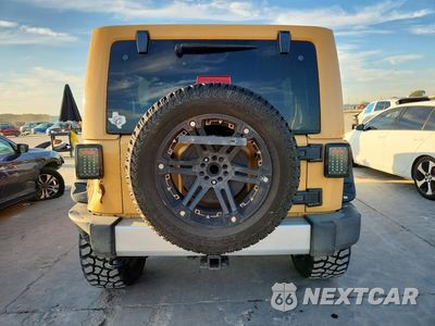 Zdjęcie 6 z 13 samochodu: 2014 JEEP WRANGLER UNLIMITED SAHARA VIN:1C4BJWEG5EL110854 - miniatura
