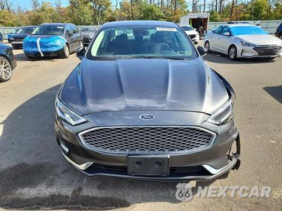 Piąte zdjęcie samochodu w środku: 2020 FORD FUSION TITANIUM VIN:3FA6P0SU0LR142431 - miniatura