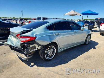 Trzecie zdjęcie samochodu z tyłu: 2014 FORD FUSION SE HYBRID VIN:3FA6P0LU0ER157156 - miniatura