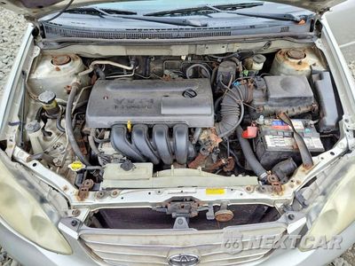 Zdjęcie 11 z 12 samochodu: 2003 TOYOTA COROLLA LE VIN:JTDBR32E332002651 - miniatura
