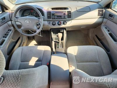 Zdjęcie 8 z 12 samochodu: 2004 TOYOTA CAMRY LE VIN:4T1BE32K34U927692 - miniatura