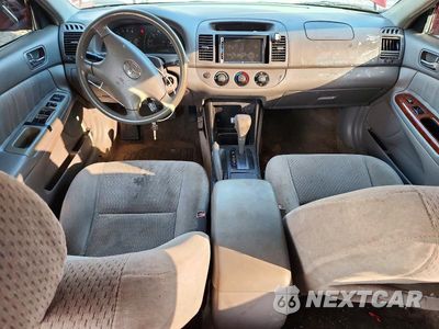 Zdjęcie 8 z 13 samochodu: 2003 TOYOTA CAMRY LE VIN:4T1BE32K93U134461 - miniatura