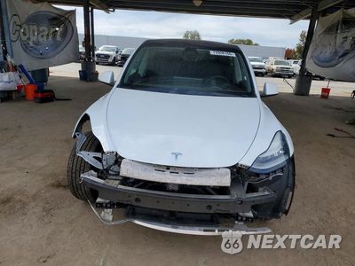 Piąte zdjęcie samochodu w środku: 2021 TESLA MODEL Y VIN:5YJYGDEE3MF096918 - miniatura