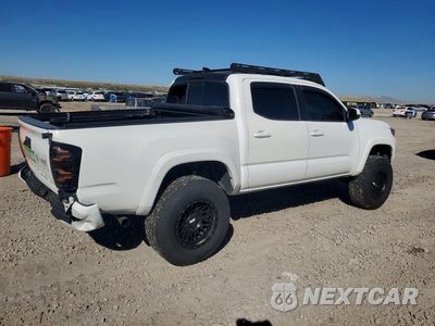 Trzecie zdjęcie samochodu z tyłu: 2016 TOYOTA TACOMA TRD SPORT VIN:3TMCZ5AN0GM034490 - miniatura