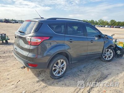 Trzecie zdjęcie samochodu z tyłu: 2018 FORD ESCAPE SE VIN:1FMCU9GD9JUA53915 - miniatura