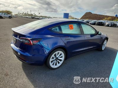 Trzecie zdjęcie samochodu z tyłu: 2023 TESLA MODEL 3 VIN:5YJ3E1EB3PF669261 - miniatura