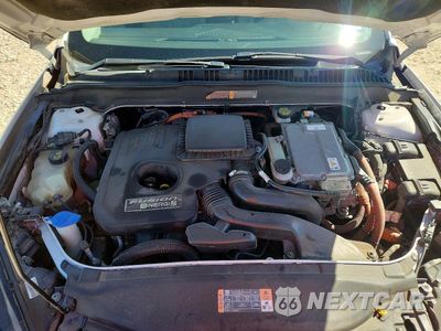 Zdjęcie 11 z 12 samochodu: 2014 FORD FUSION TITANIUM PHEV VIN:3FA6P0SU9ER383116 - miniatura
