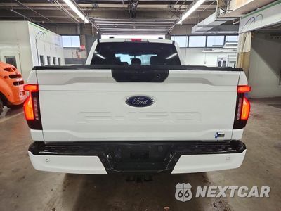 Zdjęcie 6 z 12 samochodu: 2022 FORD F150 LIGHTNING PRO VIN:1FTVW1EL0NWG12796 - miniatura
