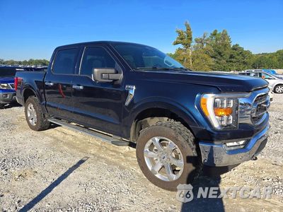 Czwarte zdjęcie samochodu z boku: 2022 FORD F150 XLT VIN:1FTFW1E52NKD64869 - miniatura