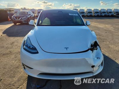 Piąte zdjęcie samochodu w środku: 2022 TESLA MODEL Y VIN:7SAYGAEE9NF515647 - miniatura