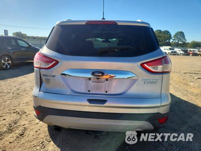 Zdjęcie 6 z 13 samochodu: 2014 FORD ESCAPE TITANIUM VIN:1FMCU0J98EUB08022 - miniatura