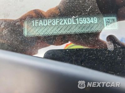 Zdjęcie 12 z 12 samochodu: 2013 FORD FOCUS SE VIN:1FADP3F2XDL159349 - miniatura