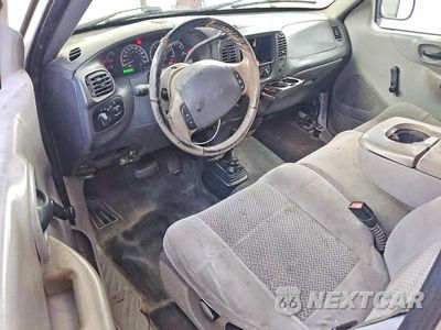 Zdjęcie 8 z 12 samochodu: 2003 FORD F150 VIN:1FTRX18L33NB21913 - miniatura