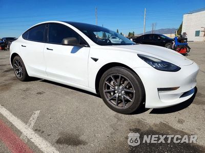 Czwarte zdjęcie samochodu z boku: 2018 TESLA MODEL 3 VIN:5YJ3E1EA3JF017271 - miniatura