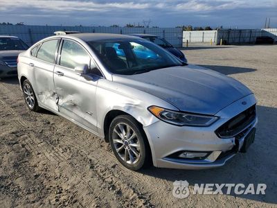 Czwarte zdjęcie samochodu z boku: 2017 FORD FUSION SE PHEV VIN:3FA6P0PU2HR306763 - miniatura