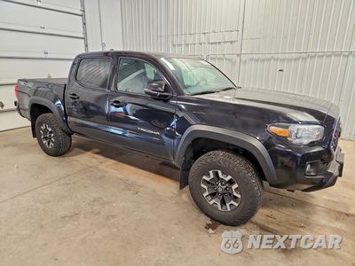 Czwarte zdjęcie samochodu z boku: 2018 TOYOTA TACOMA TRD OFF-ROAD VIN:3TMCZ5AN7JM179291 - miniatura