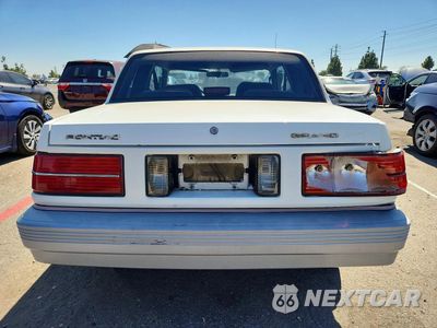 Zdjęcie 6 z 12 samochodu: 1987 PONTIAC GRAND AM LE VIN:1G2NV14U6HC939419 - miniatura
