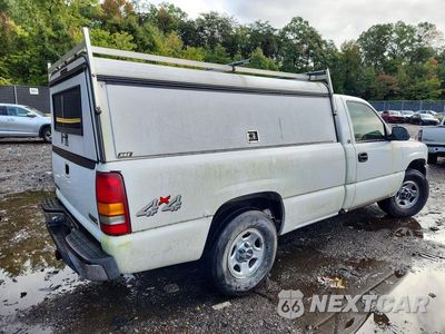 Trzecie zdjęcie samochodu z tyłu: 1999 GMC NEW SIERRA K1500 VIN:1GTEK14T2XE512088 - miniatura