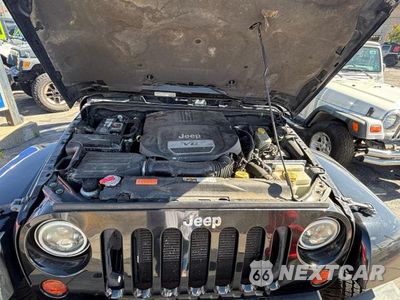 Zdjęcie 7 z 11 samochodu: 2014 JEEP WRANGLER UNLIMITED SAHARA VIN:1C4BJWEG2EL178982 - miniatura