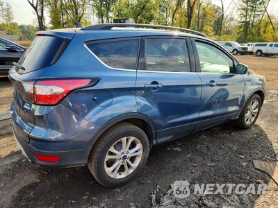 Trzecie zdjęcie samochodu z tyłu: 2018 FORD ESCAPE SEL VIN:1FMCU9HD6JUB01627 - miniatura