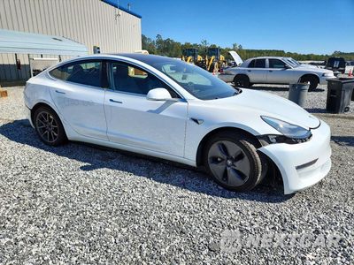 Czwarte zdjęcie samochodu z boku: 2018 TESLA MODEL 3 VIN:5YJ3E1EA6JF062432 - miniatura