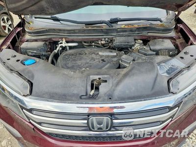 Zdjęcie 12 z 13 samochodu: 2016 HONDA PILOT ELITE VIN:5FNYF6H04GB111302 - miniatura