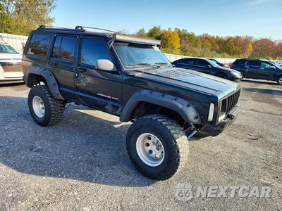 Czwarte zdjęcie samochodu z boku: 2000 JEEP CHEROKEE SPORT VIN:1J4FF48S5YL264213 - miniatura