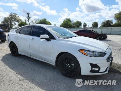Czwarte zdjęcie samochodu z boku: 2019 FORD FUSION SE VIN:3FA6P0HD7KR215400 - miniatura