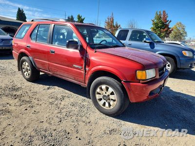 Czwarte zdjęcie samochodu z boku: 1999 HONDA PASSPORT EX VIN:4S6CM58W7X4426314 - miniatura