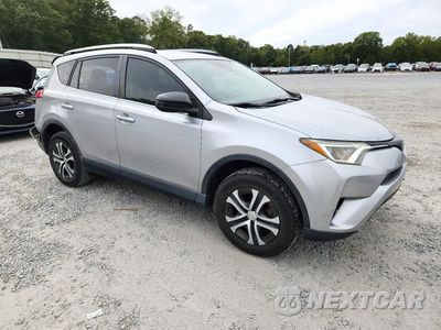 Czwarte zdjęcie samochodu z boku: 2018 TOYOTA RAV4 LE VIN:JTMBFREV8JJ242109 - miniatura