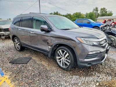 Czwarte zdjęcie samochodu z boku: 2018 HONDA PILOT TOURING VIN:5FNYF6H91JB058418 - miniatura