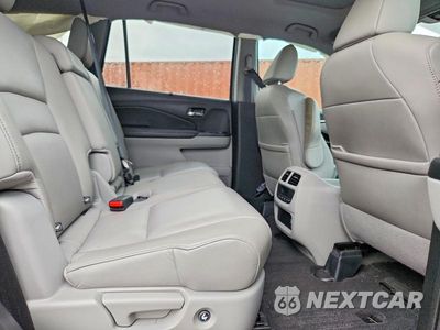 Zdjęcie 11 z 14 samochodu: 2019 HONDA PILOT EXL VIN:5FNYF5H5XKB041870 - miniatura