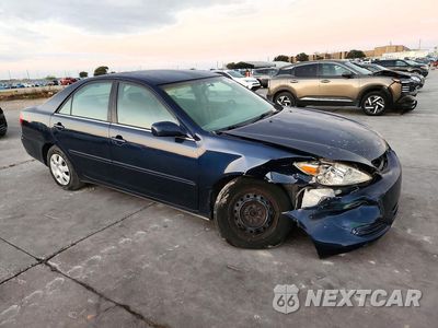Czwarte zdjęcie samochodu z boku: 2002 TOYOTA CAMRY LE VIN:4T1BE32K62U619056 - miniatura