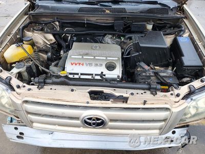 Zdjęcie 12 z 14 samochodu: 2004 TOYOTA HIGHLANDER BASE VIN:JTEGP21A540041660 - miniatura