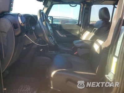Zdjęcie 7 z 13 samochodu: 2016 JEEP WRANGLER UNLIMITED SAHARA VIN:1C4HJWEG2GL333432 - miniatura